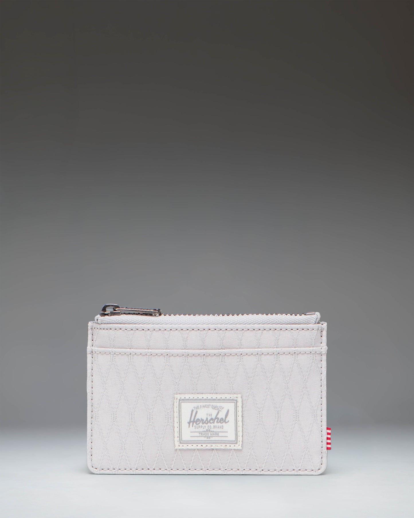 Herschel Supply Co. Oscar Cardholder wallet in Vapor Diamond and Charcoal Gray.