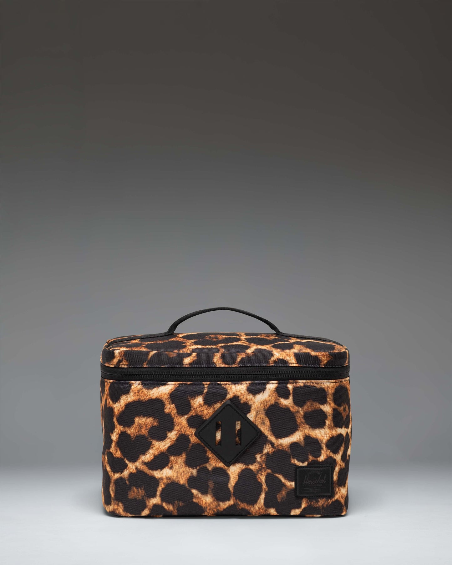 Herschel Heritage Lunch Box in Digi Leopard Light Large featuring an insulated main compartment and a front zippered pocket.