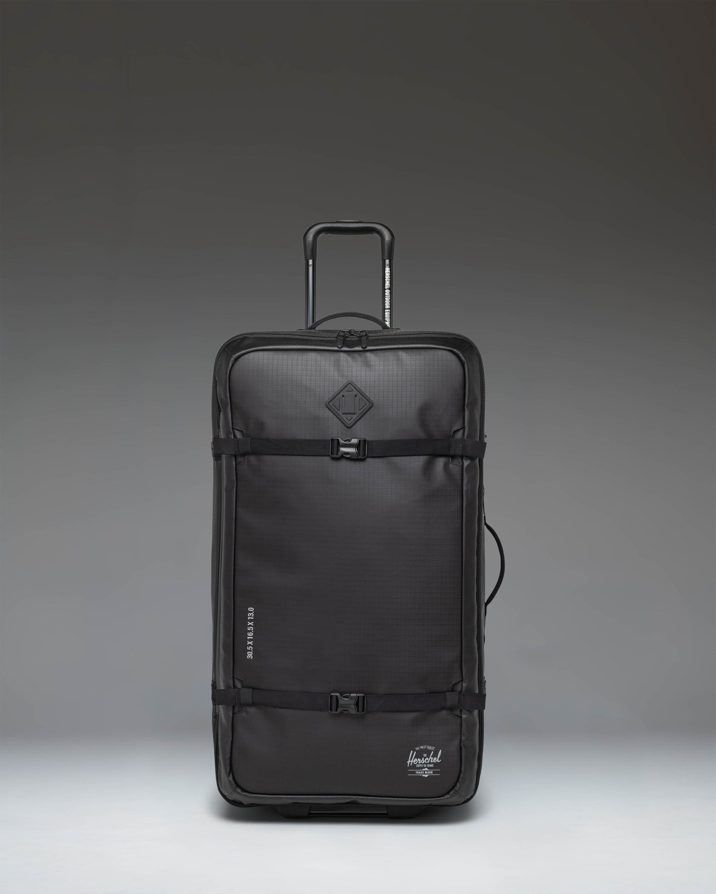 Herschel Supply Co All Season Hybrid Roller Bag Large in Black, shown from an oversized front angle view.