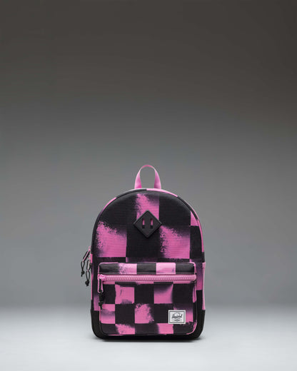 Herschel Heritage Kids Backpack in Stencil Checker Opera Mauve, featuring a checkered pattern with shades of pink and purple.