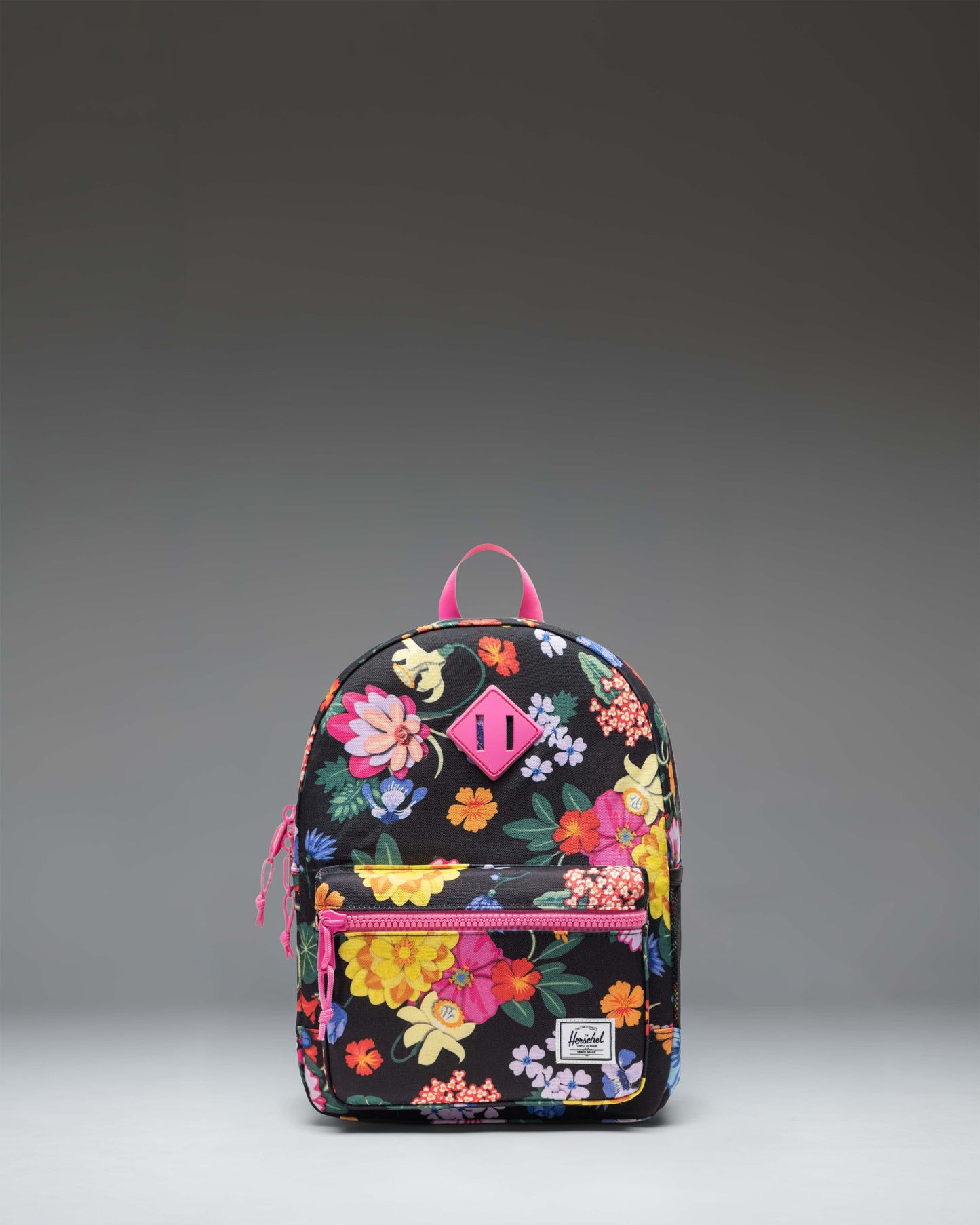 Herschel Heritage Kids Backpack in Paper Garden floral print, shown from the front.