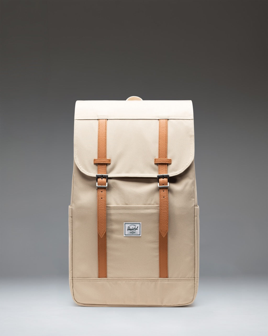 Herschel Retreat Backpack in Eucalyptus green, showing the front view with dual straps and classic logo label.