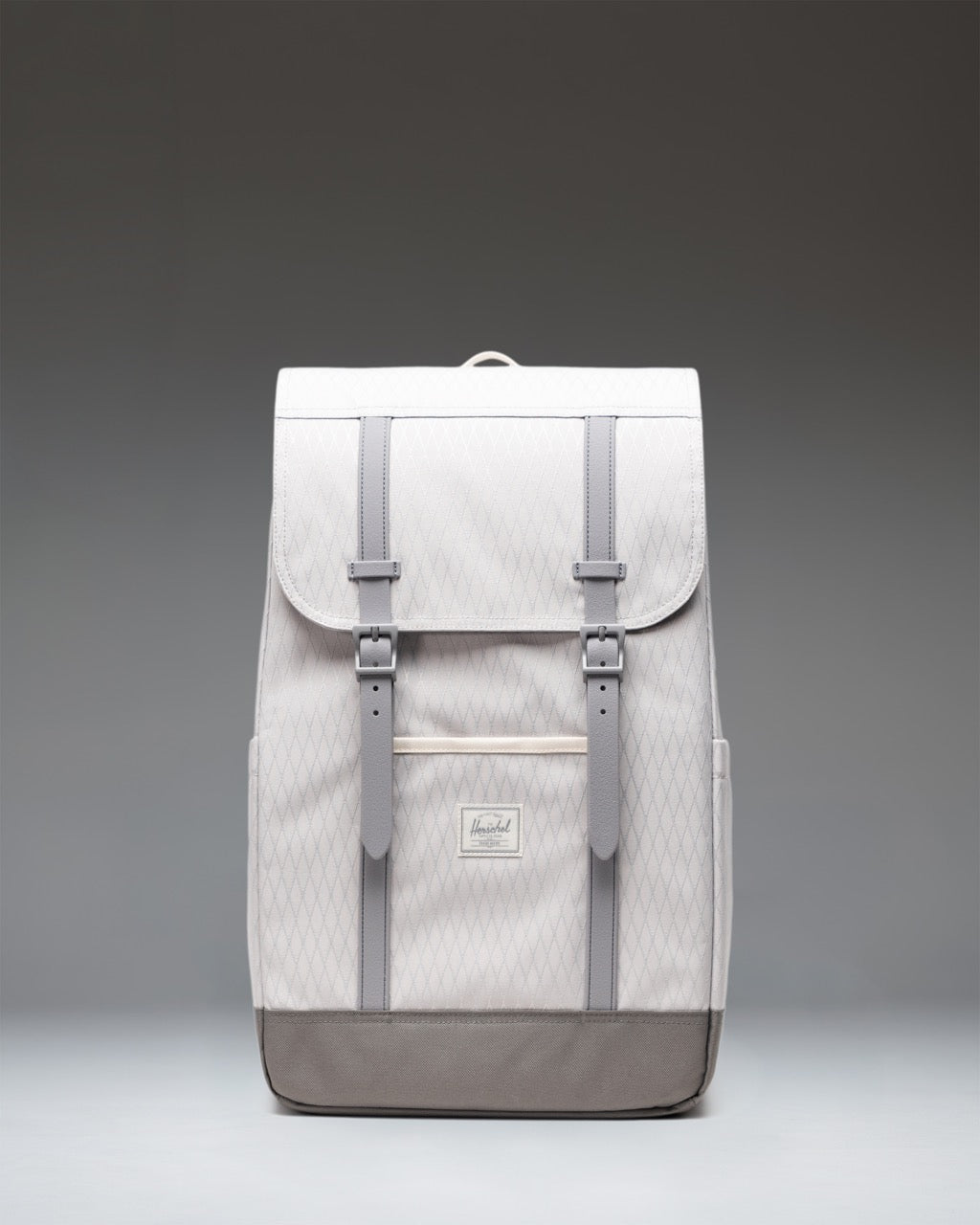 Herschel Retreat Backpack in Vapor Diamond and Charcoal Gray, featuring dual rubber straps, a front storage sleeve, and a woven logo label.