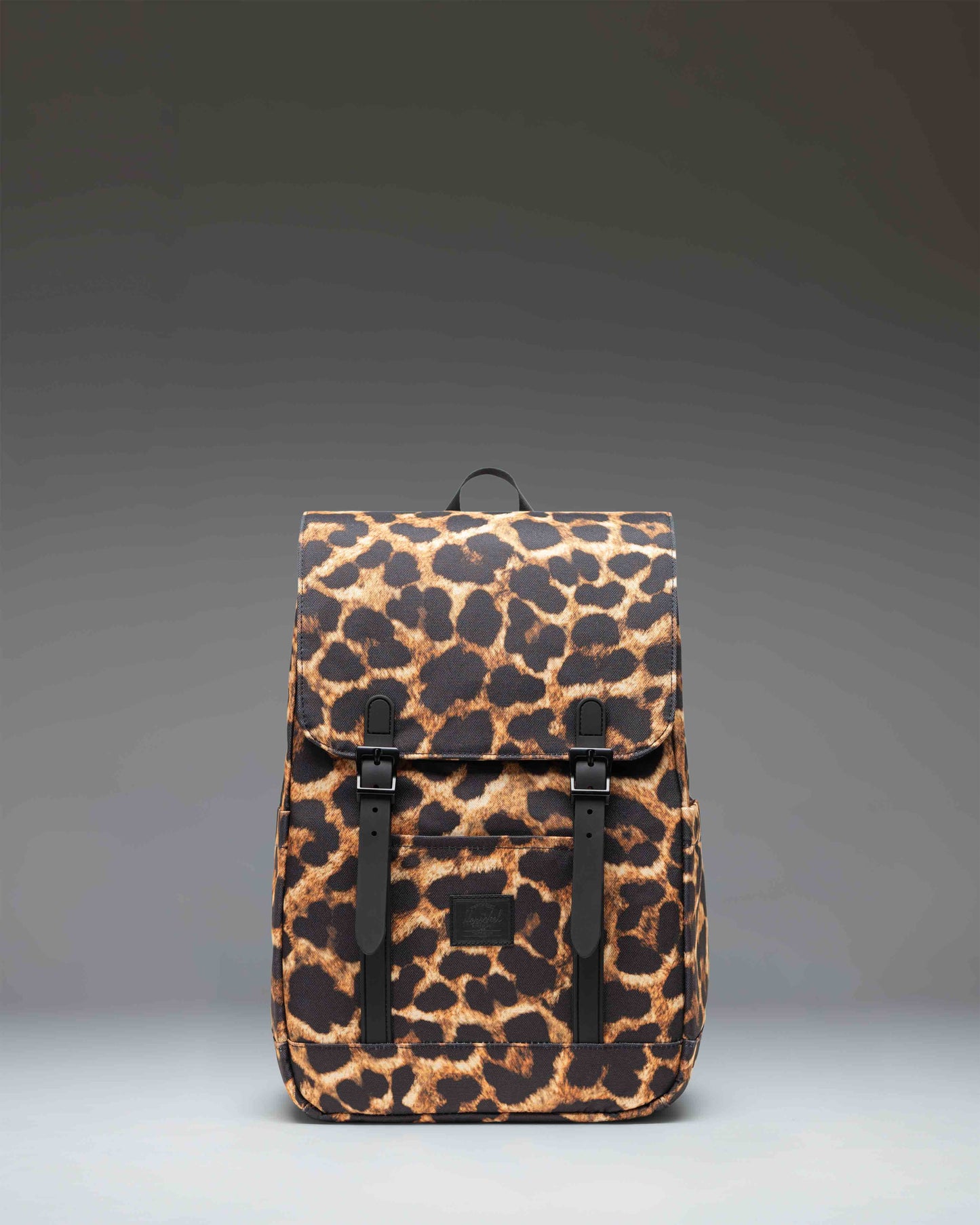 Herschel Retreat Small Backpack in Digi Leopard Light Large pattern showing the classic design with strap details.