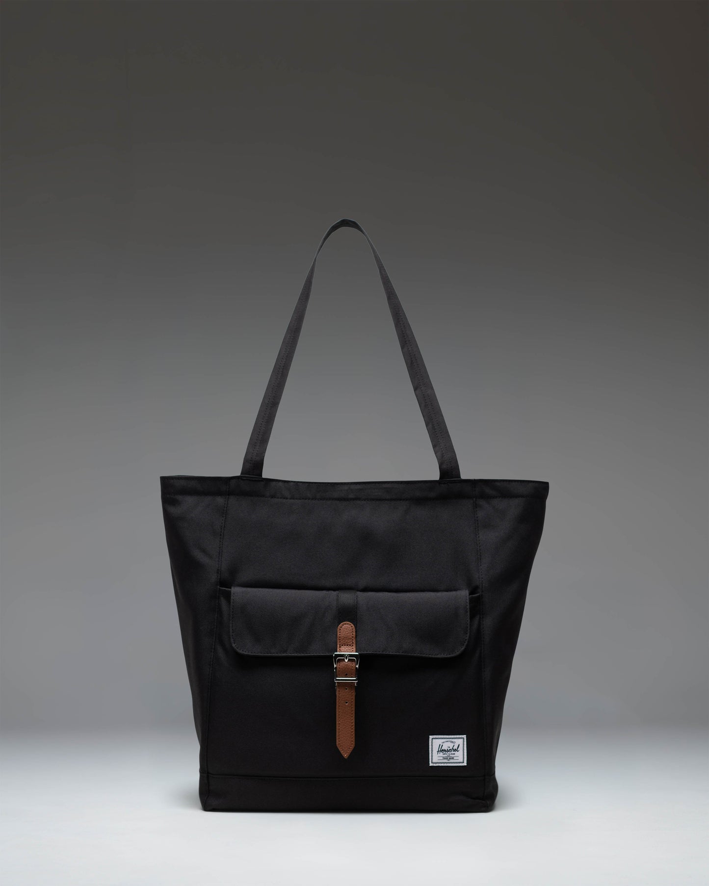 Herschel Retreat Tote bag in classic black, featuring a clean and modern design.