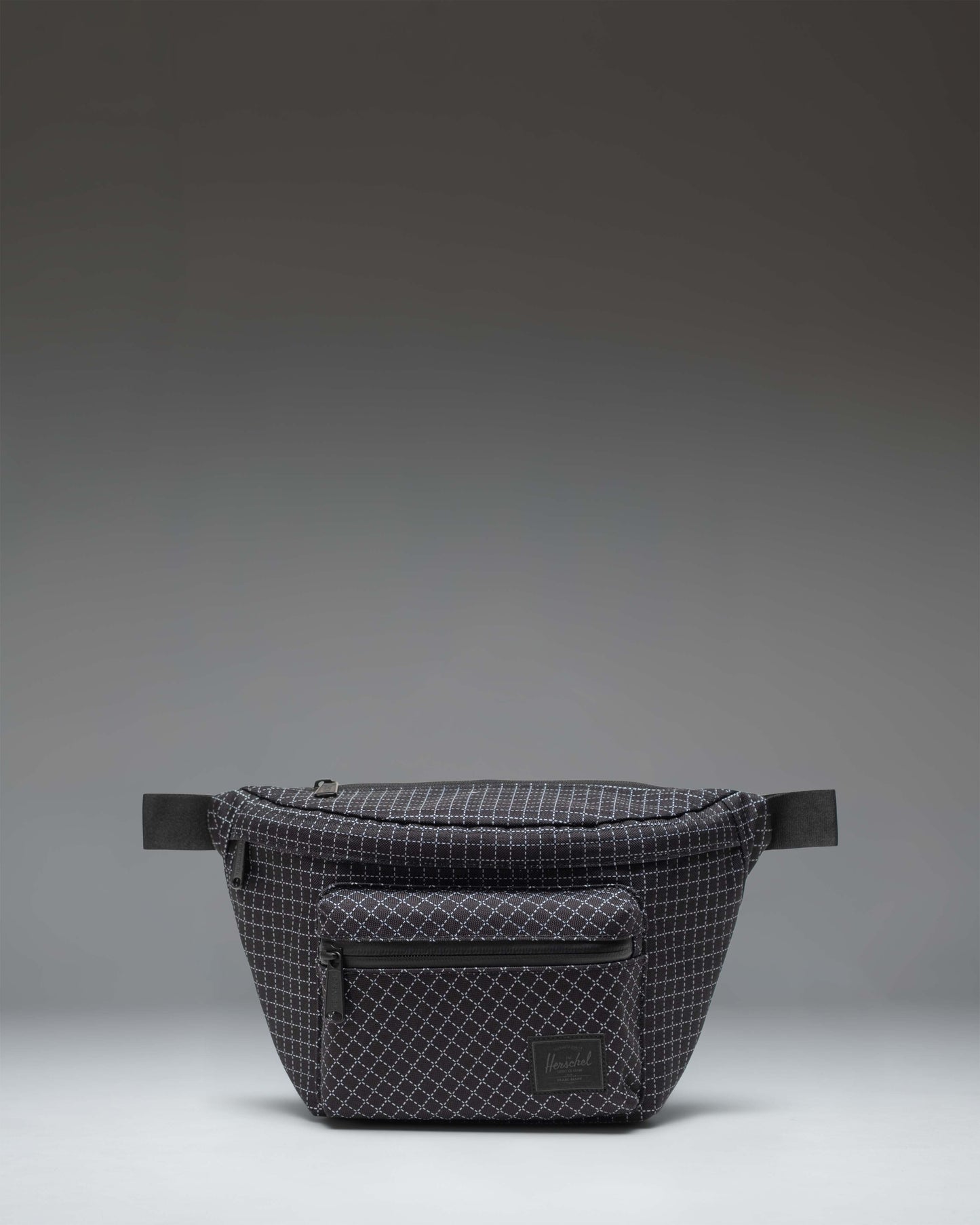 Herschel Supply Co. Pop Quiz Hip Pack in Grid - Black.