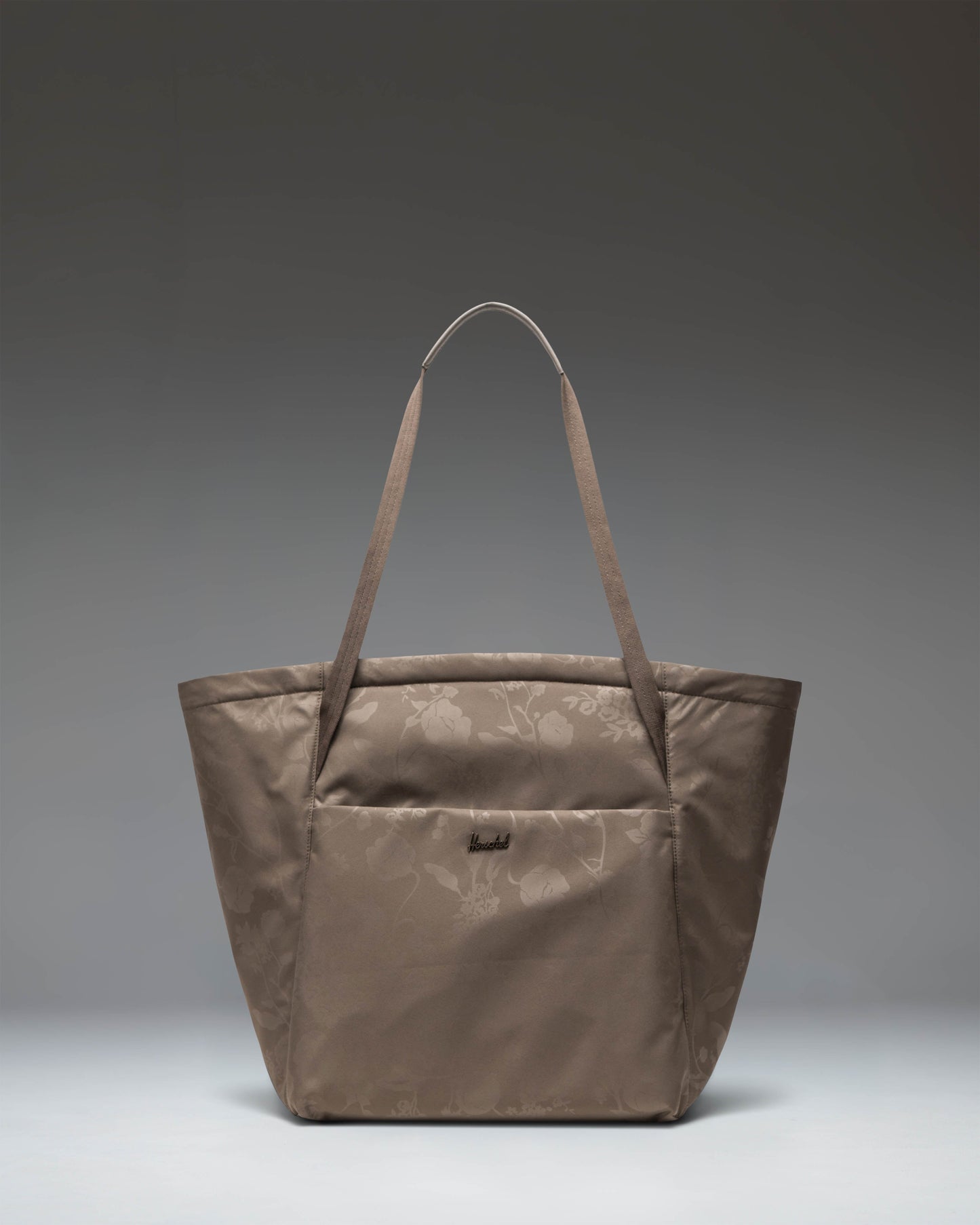 Herschel Supply Co. Joana Tote in Trailing Floral Heat Emboss, showing the spacious interior and stylish floral pattern.