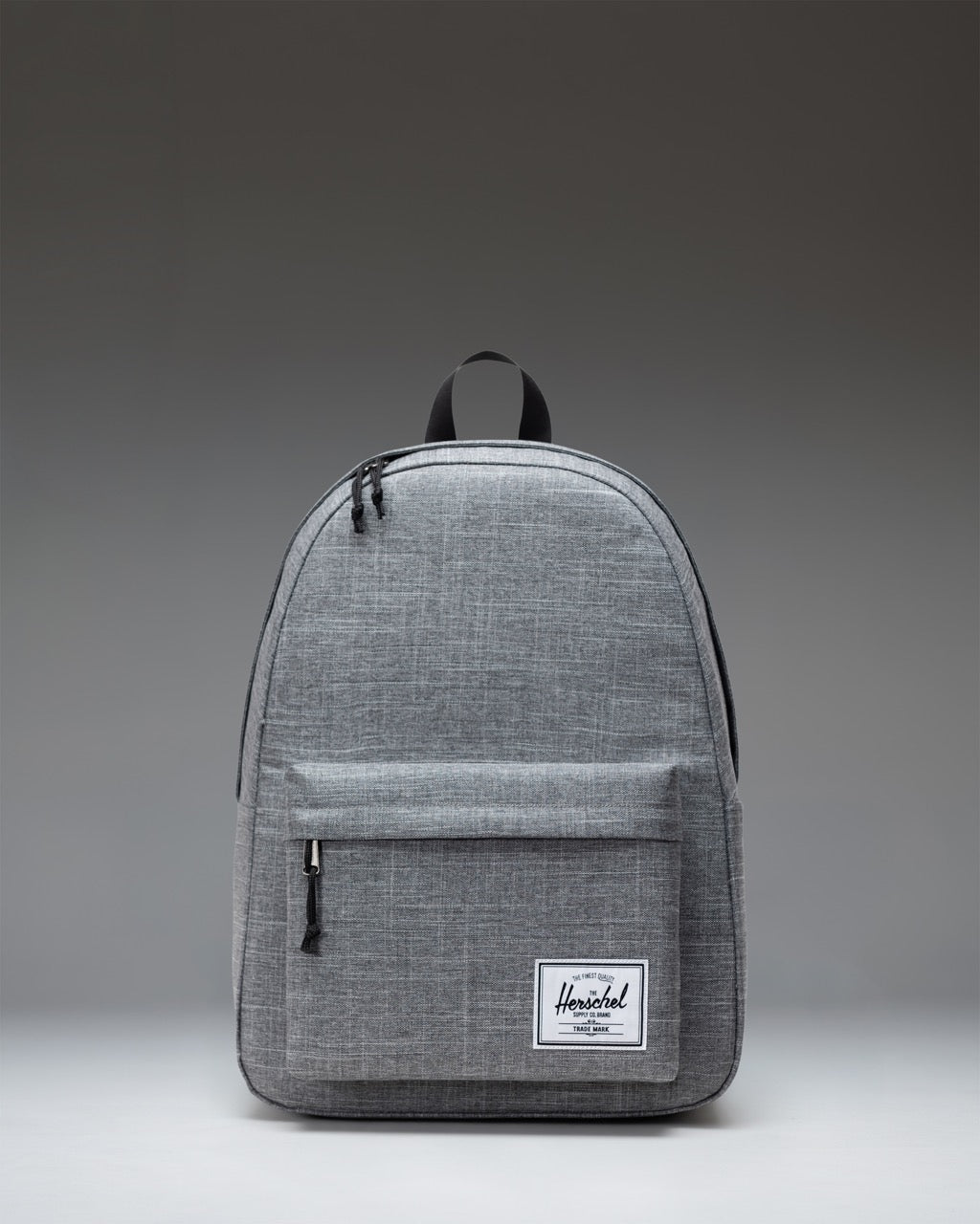 Herschel Classic XL Backpack in Raven Crosshatch heather gray colorway, showing the clean and simple design of the everyday backpack.