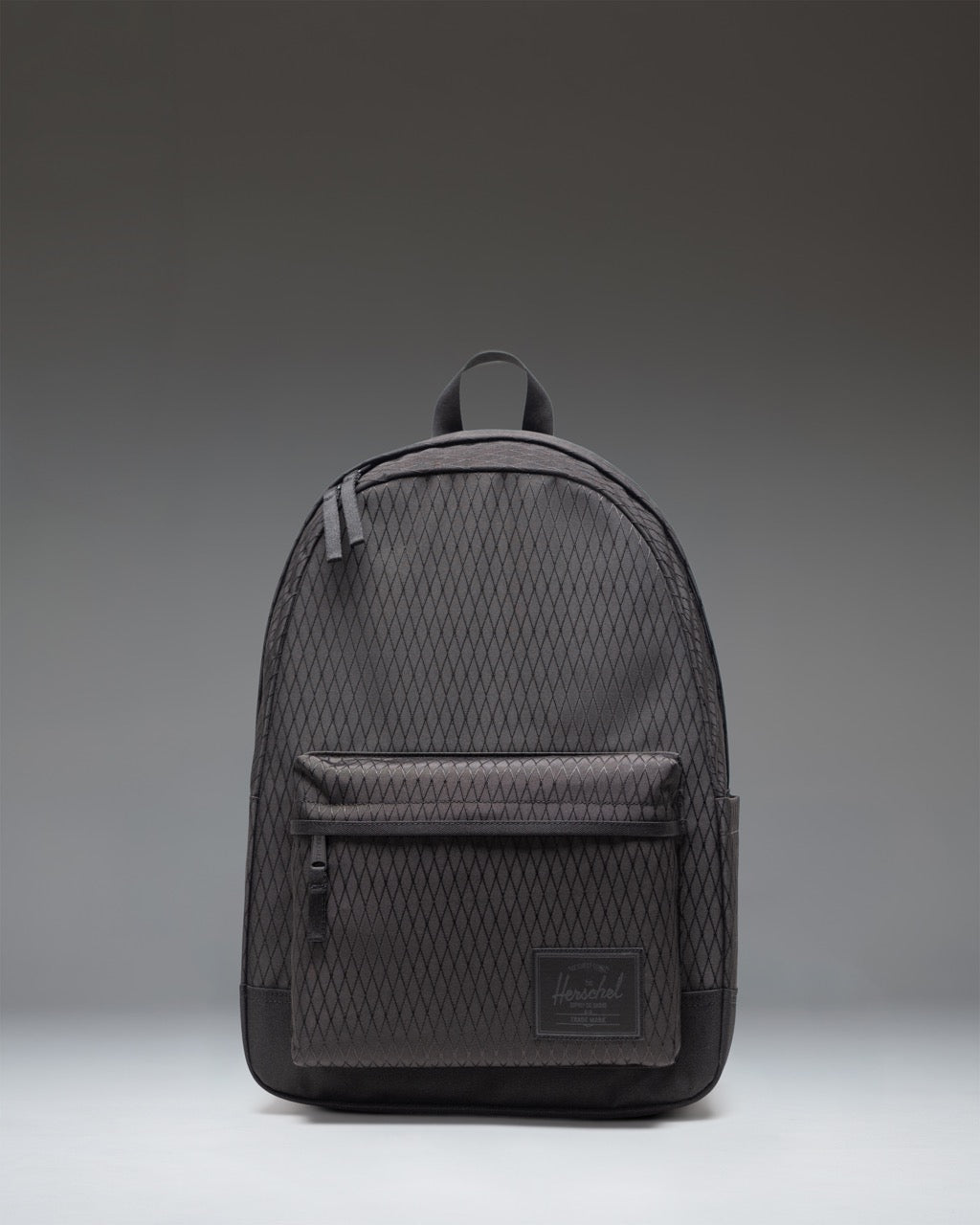 Herschel Classic XL Backpack in Black Diamond/Black showing a front view with dual water bottle pockets and a front storage pocket.