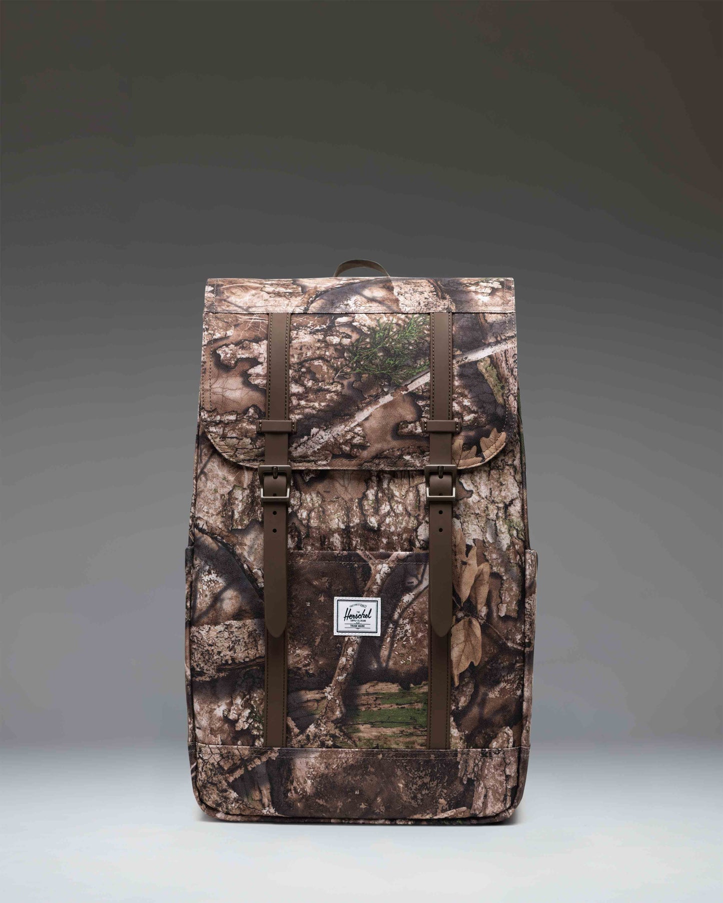 Herschel Supply Co. Realtree Retreat Backpack in Realtree APX Camo pattern with signature straps and front pocket.