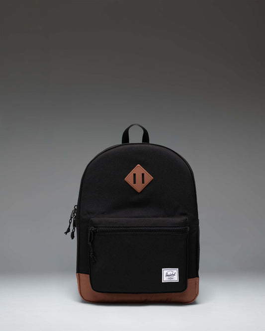 Herschel Heritage Kids Backpack in Black/Saddle Brown featuring a classic diamond accent and a convenient front pocket.