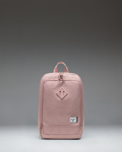Herschel Heritage Shoe Bag in Ash Rose pink, featuring a main zipper closure, a convenient side handle, and the classic Herschel woven label.