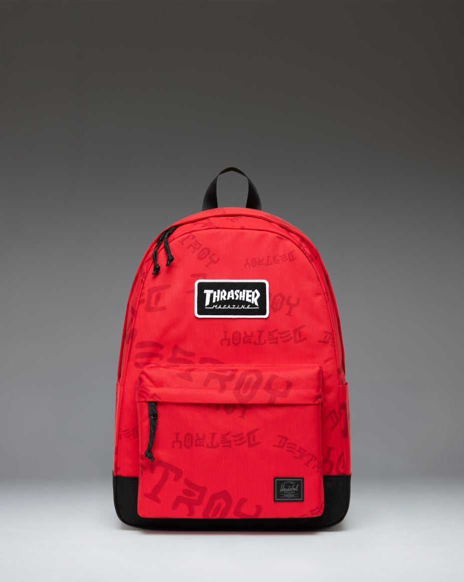 Herschel Supply Co. Thrasher Classic XL Backpack in Racing Red and Barbados Cherry Nylon, showcasing a dual-toned red design with a front pocket.