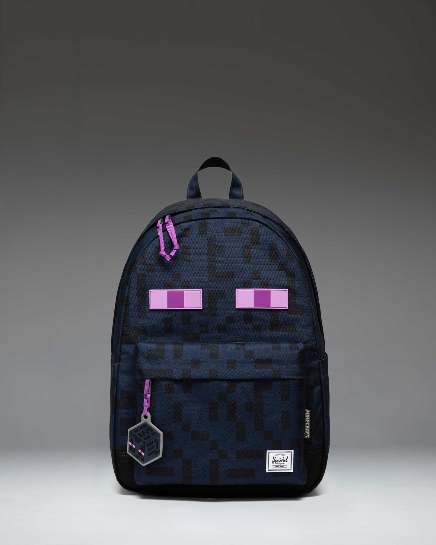 Herschel Supply Co. bag in the pixelated black and purple Minecraft Enderman colorway.