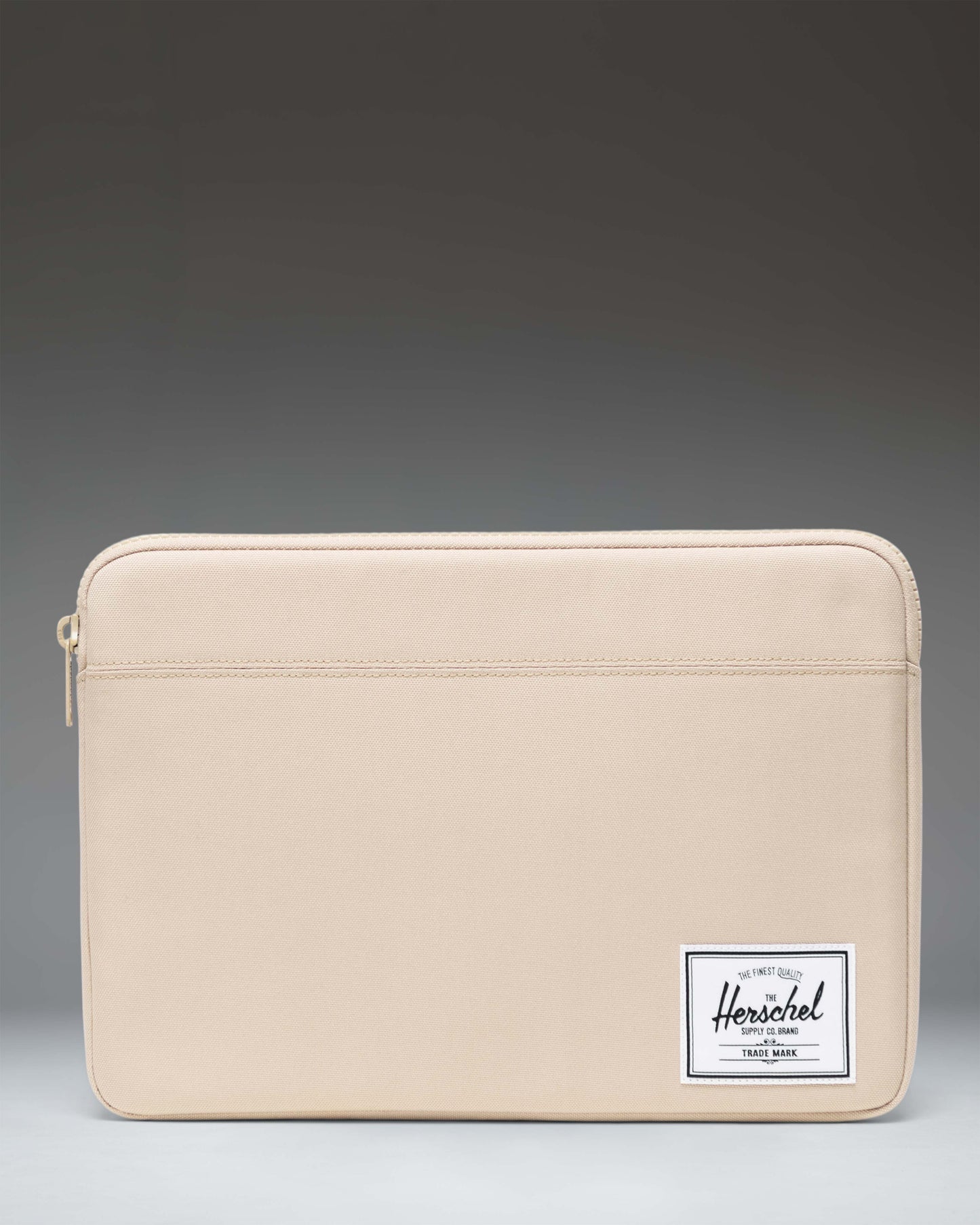 Herschel Supply Co. Anchor 14 Inch Laptop Sleeve in Eucalyptus green, showing a clean, padded minimalist design.