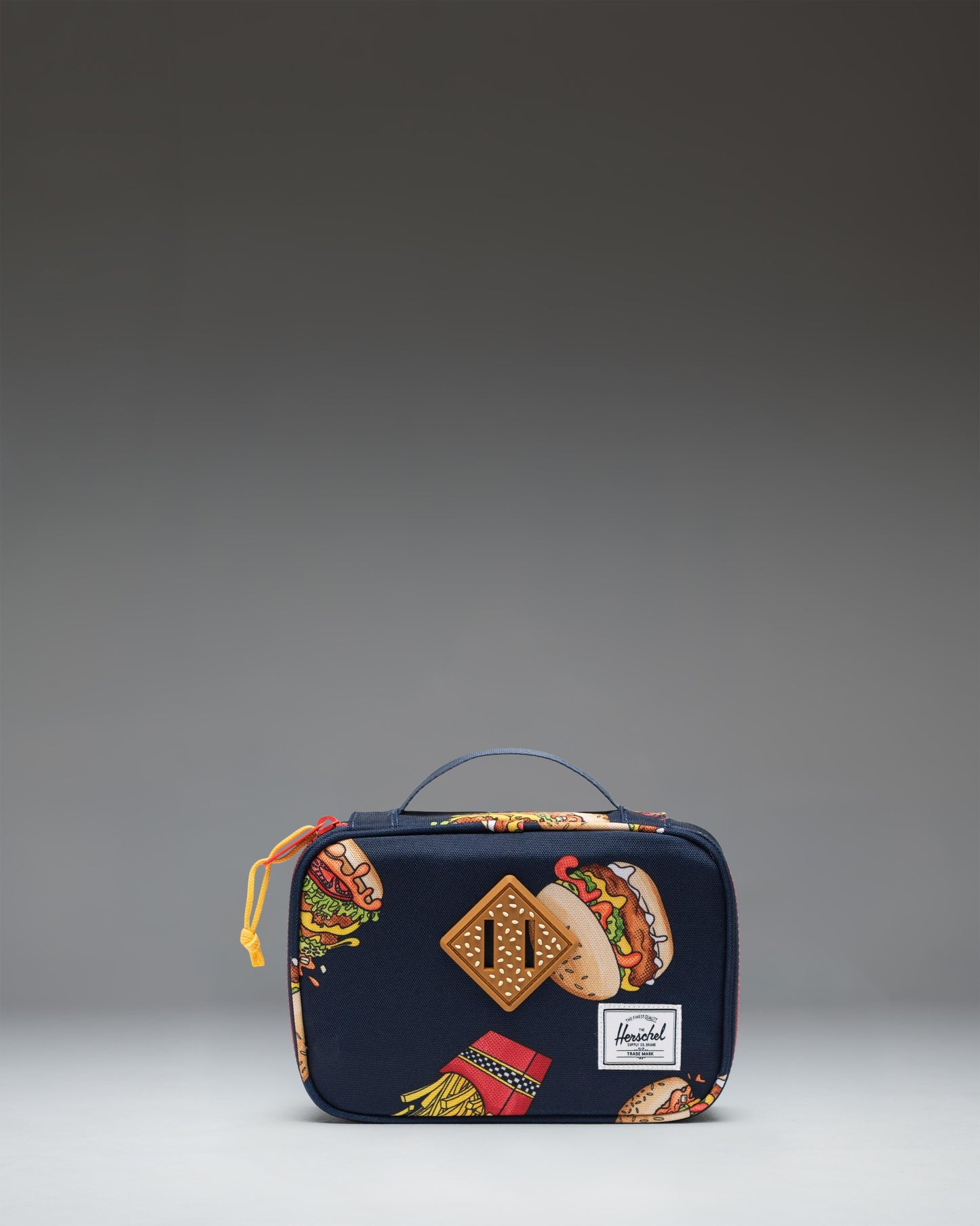 Herschel Supply Co Little Herschel Heritage Pencil Case in 19-3921TCX/17-1558TCX color showing the front view.