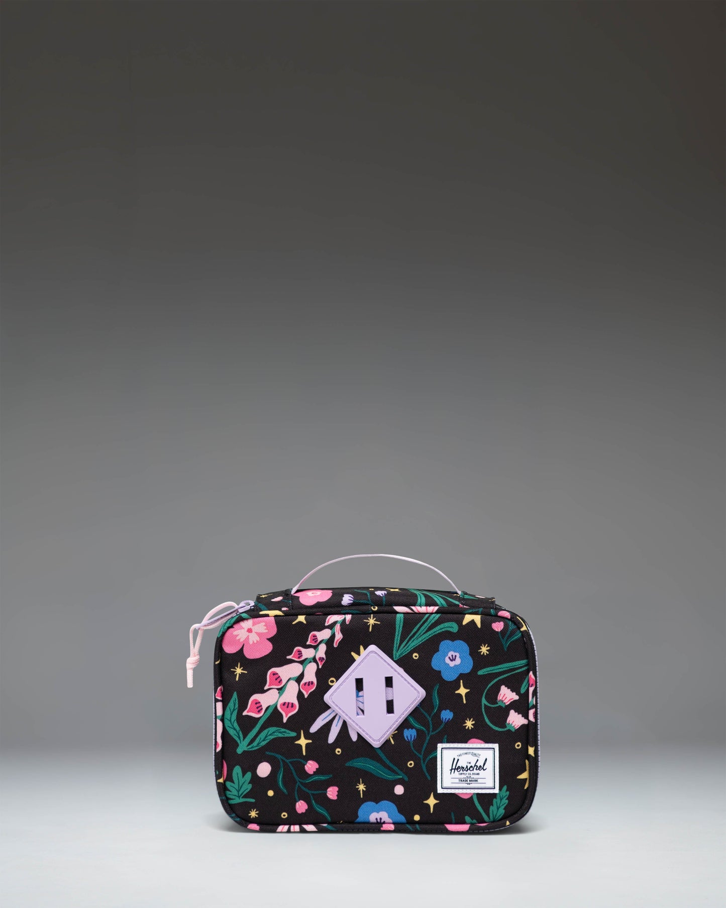 Little Herschel Heritage Pencil Case in the Enchanted Garden floral print, featuring a classic zipper closure and convenient carrying handle.