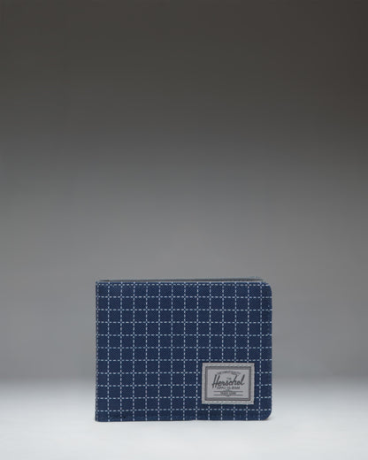 Herschel Supply Co. Roy Wallet in Grid Naval Academy/Magnet, a classic bi-fold wallet featuring a navy blue and grey grid pattern.