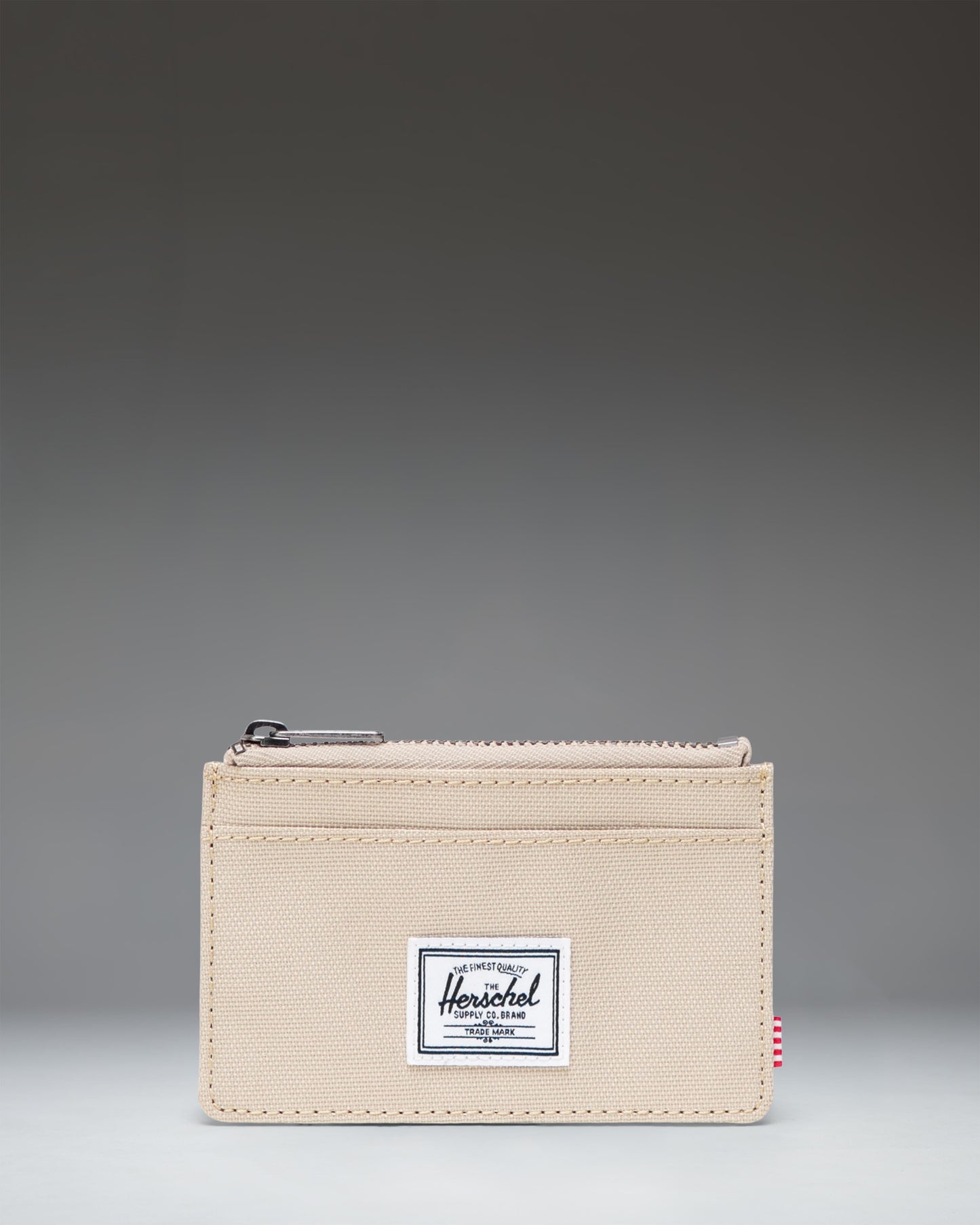 Herschel Supply Co. Oscar Cardholder wallet in Eucalyptus green.