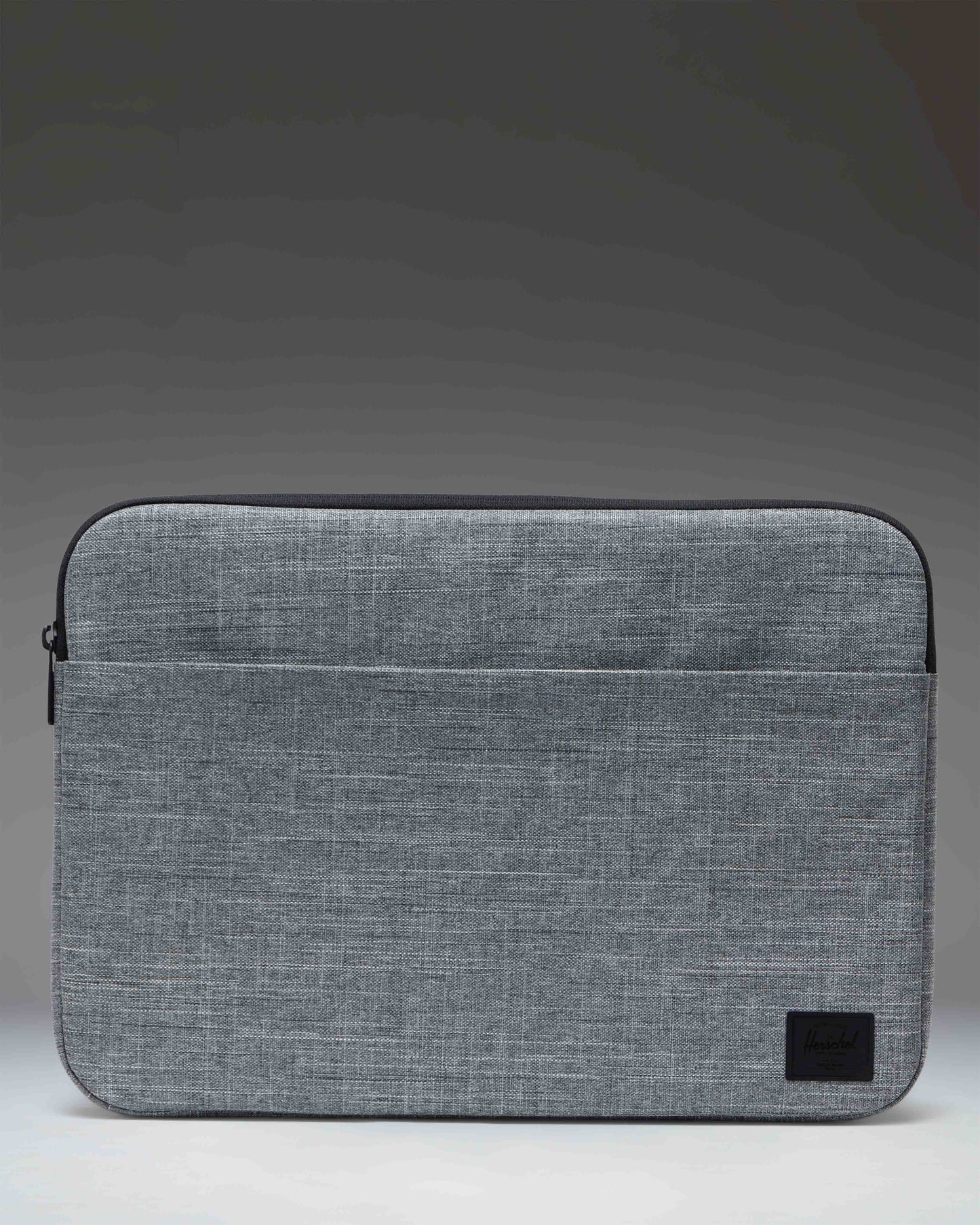 Herschel Supply Co. Denman 15-16 Inch Laptop Sleeve Tech in Raven Crosshatch grey, front view.