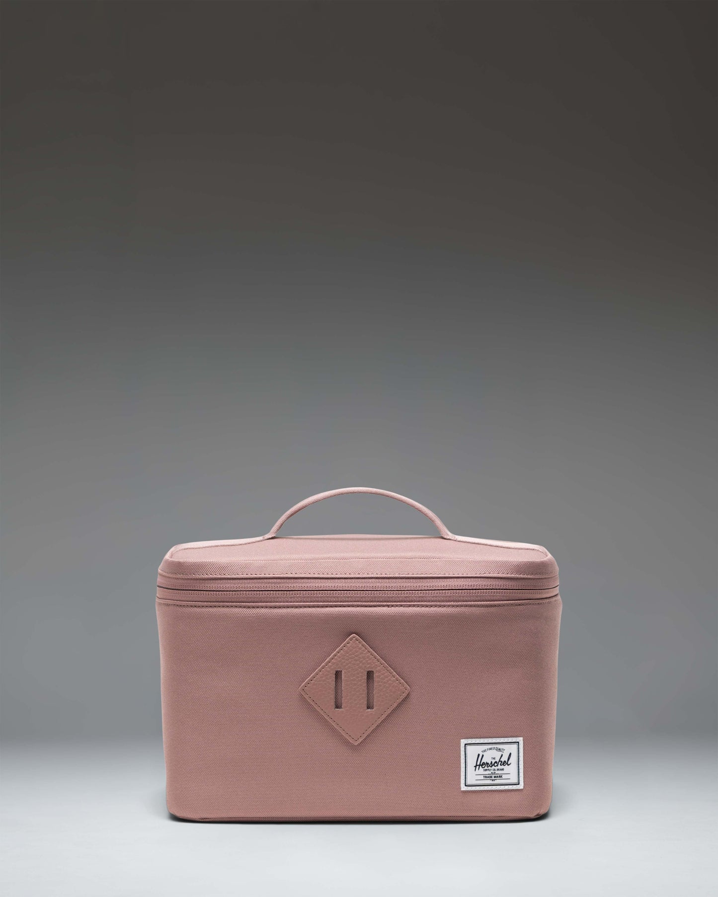 Herschel Supply Co. Herschel Heritage Lunch Box in Ash Rose pink.