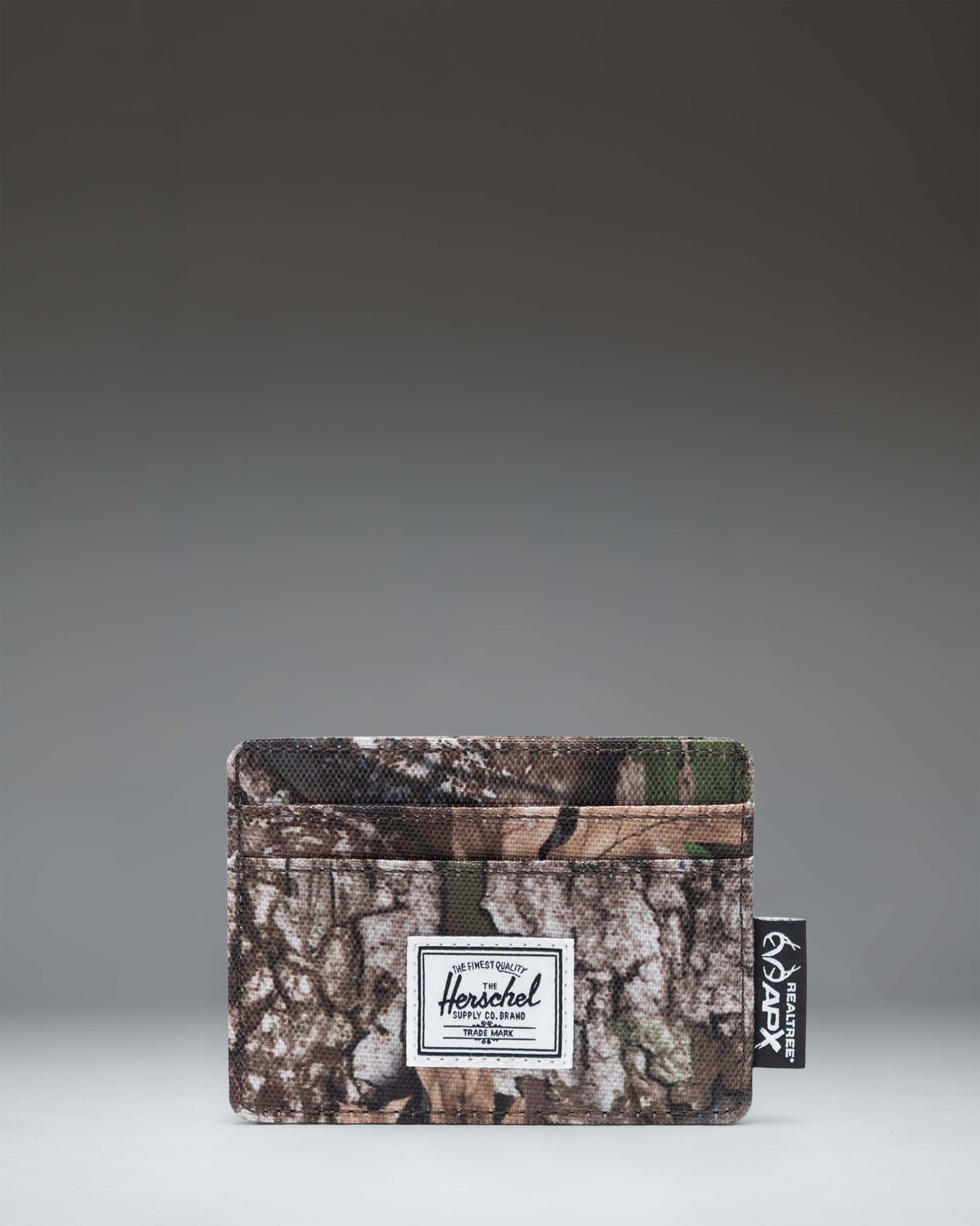 Herschel Supply Co. Charlie Cardholder in Realtree APX Camo.