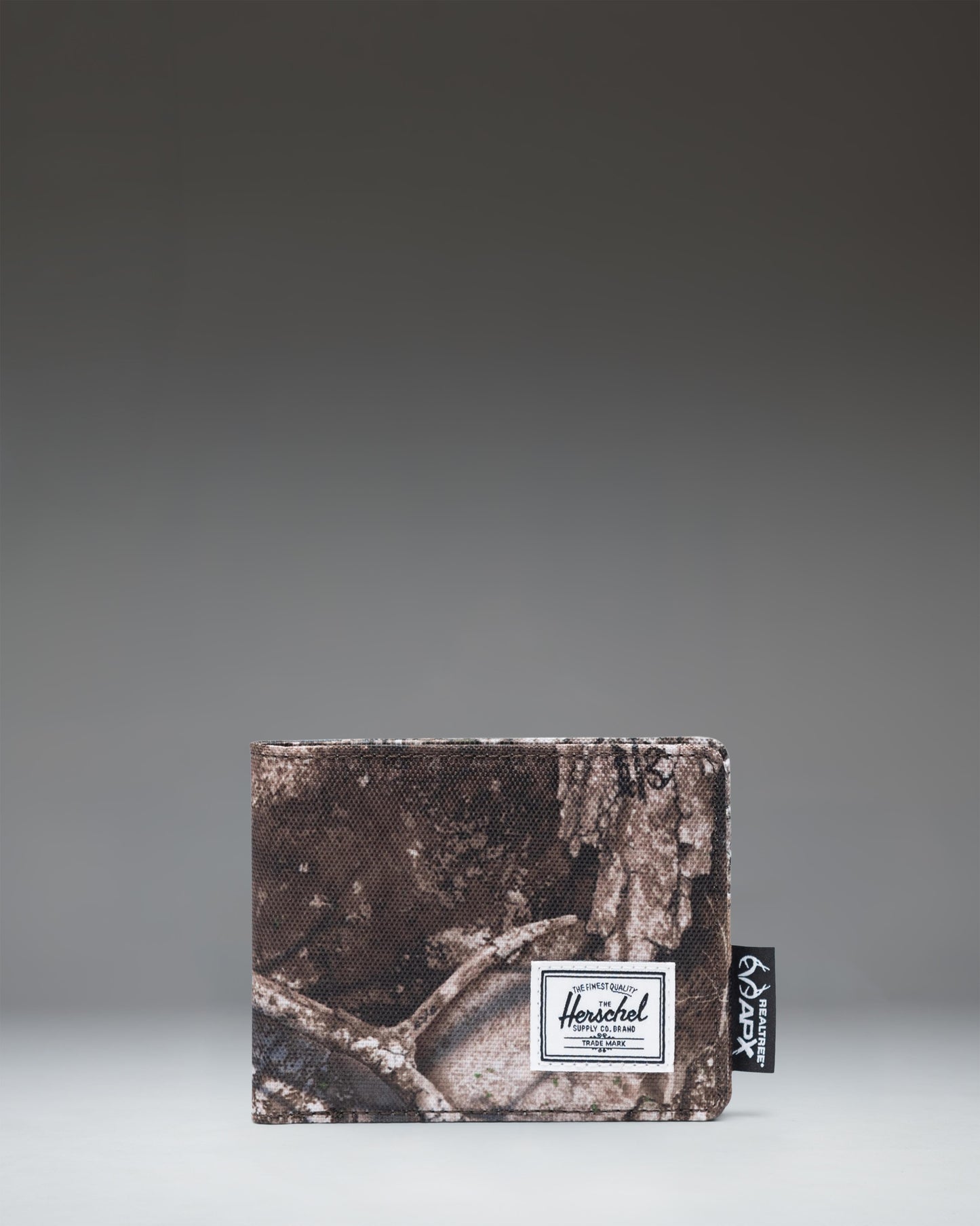Herschel Supply Co. Roy Wallet in Realtree APX Camo pattern.
