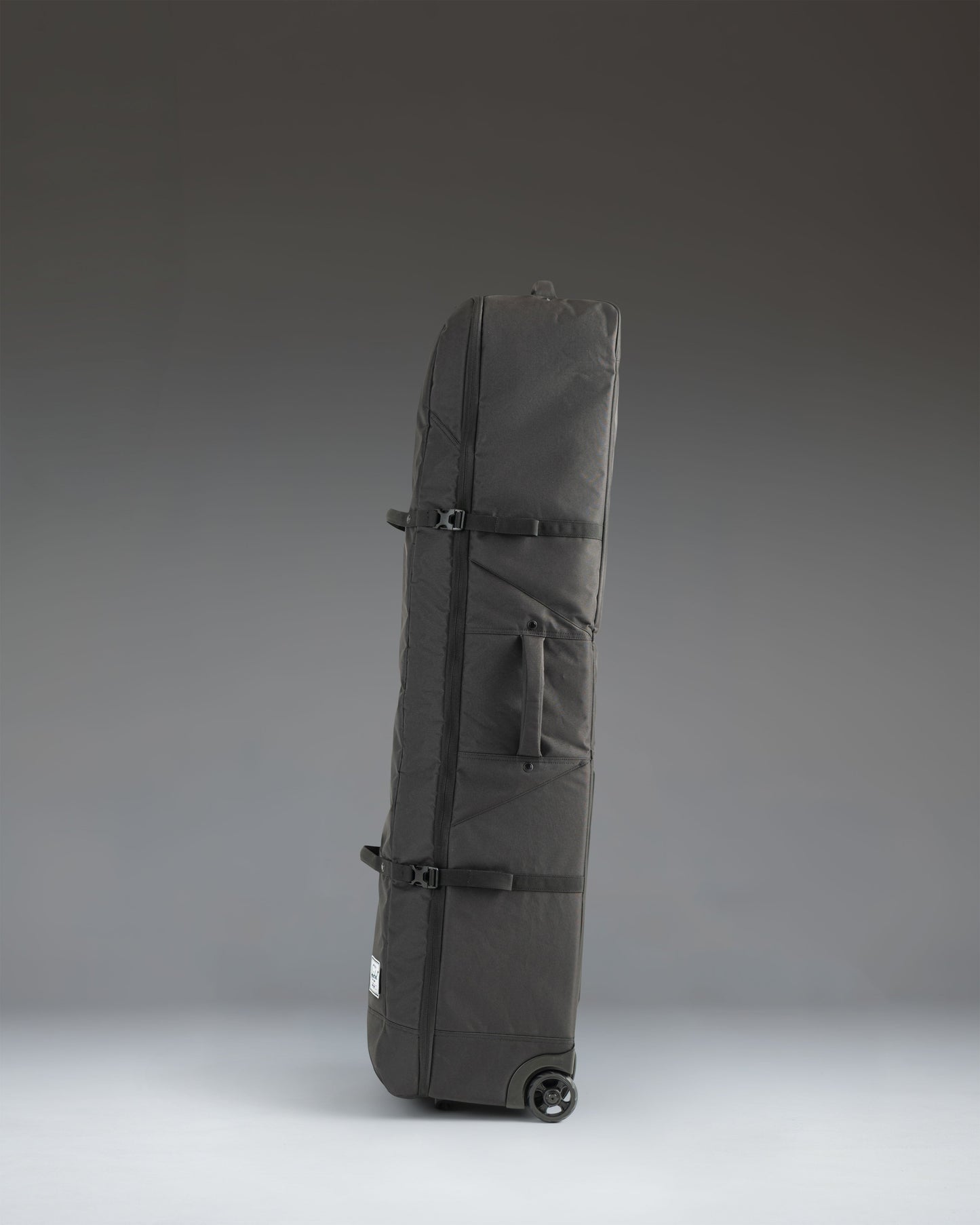 Herschel Heritage Golf Travel Wheelie Bag in black.