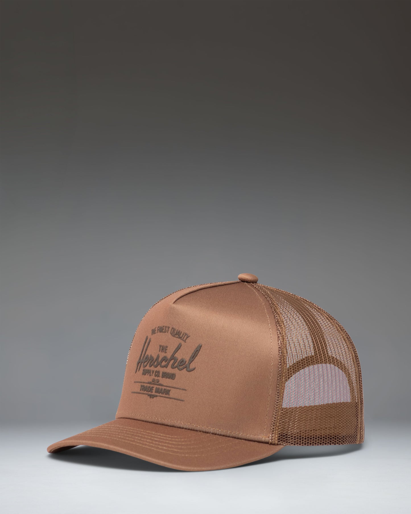 Herschel Supply Co. Whaler Tall Mesh Cap in Antique Bronze, showing the front view of the structured trucker hat with a classic logo patch.
