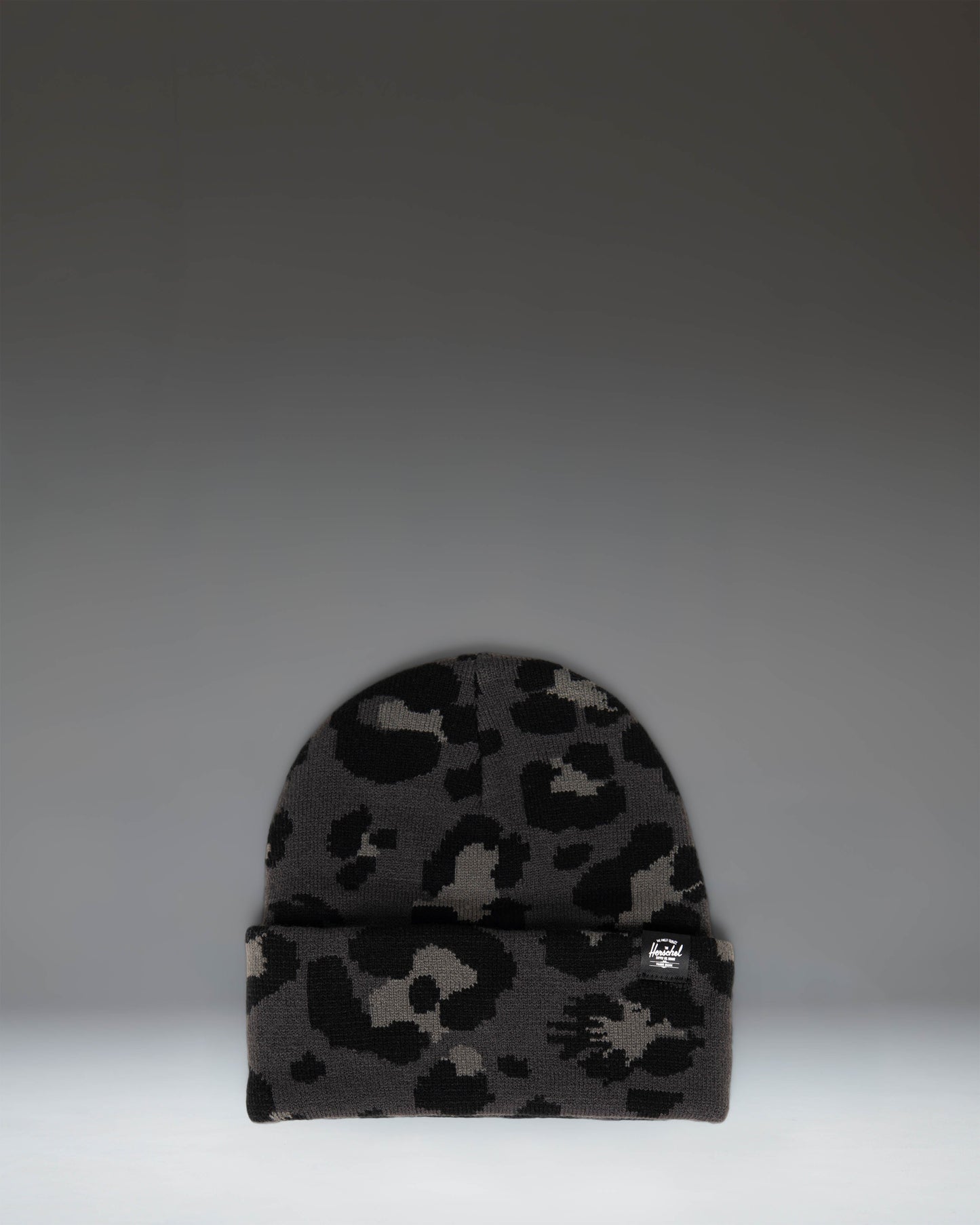Herschel Supply Co Elmer Graphic Beanie in Leopard Scribble Black Oyster knit pattern with a folded cuff.