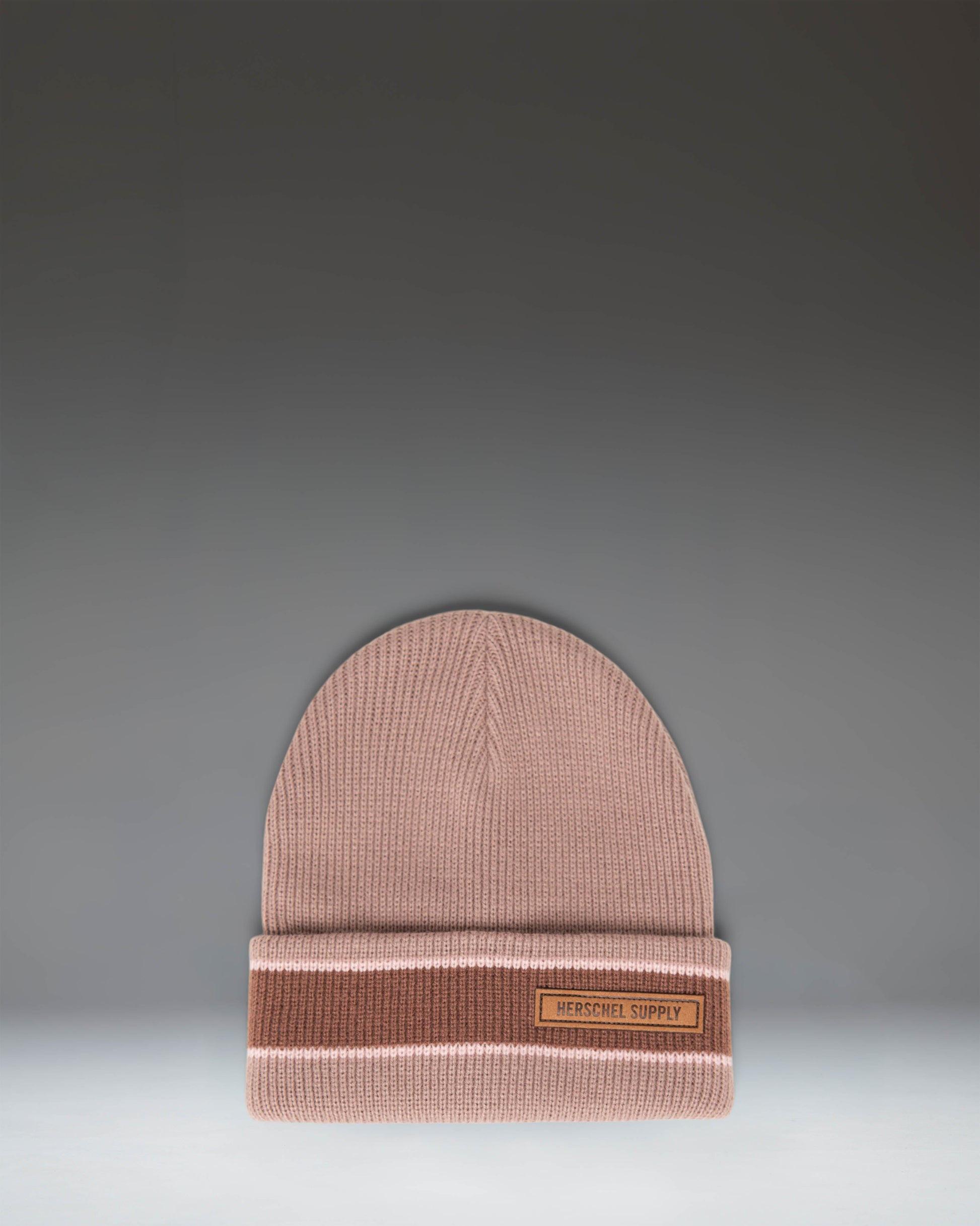 Herschel Supply Co. Elmer Ribbed Vintage Stripe beanie in Ash Rose.