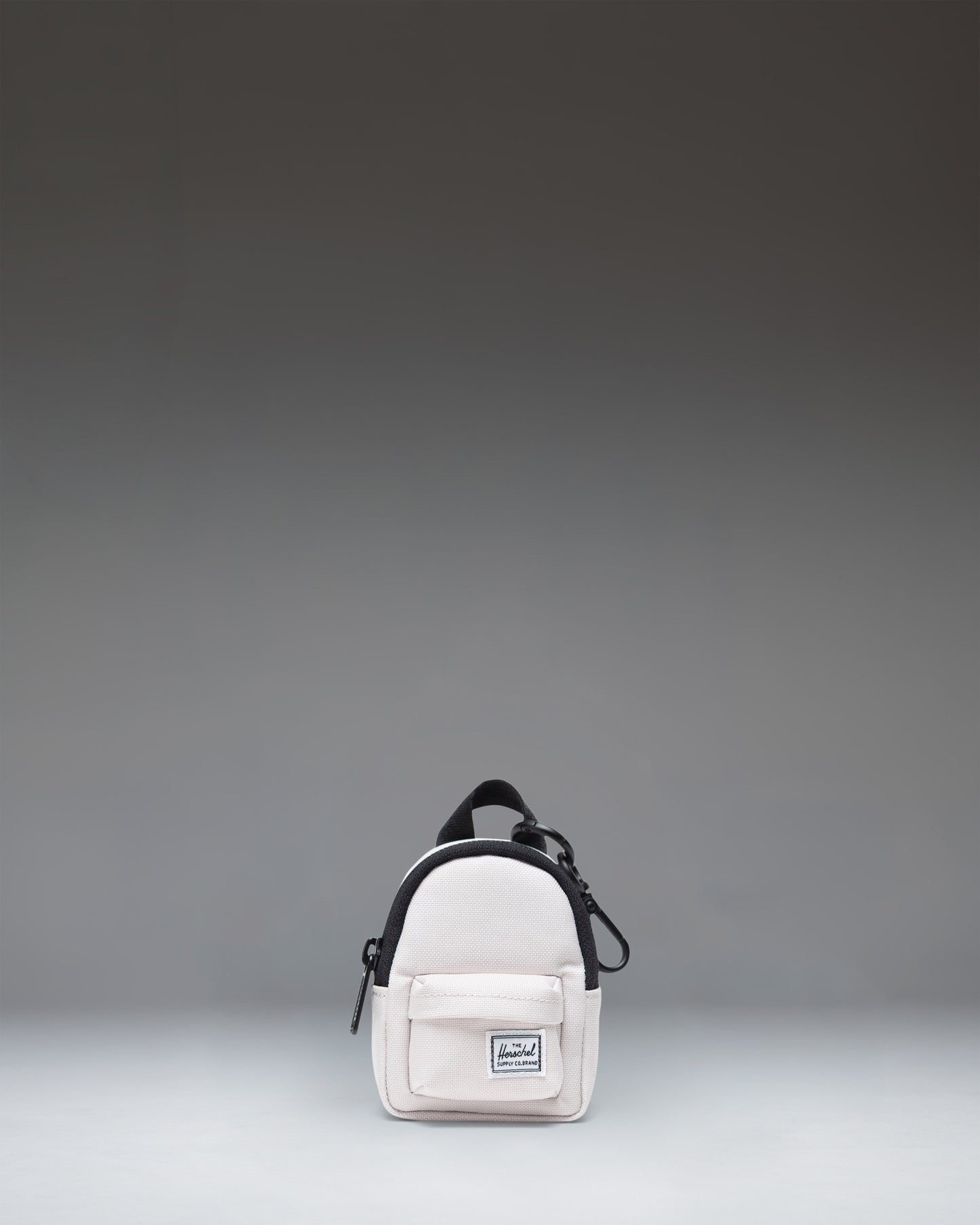 Herschel Supply Co. Classic Backpack Bag Charm in Moonbeam, showing the miniature backpack keychain accessory.