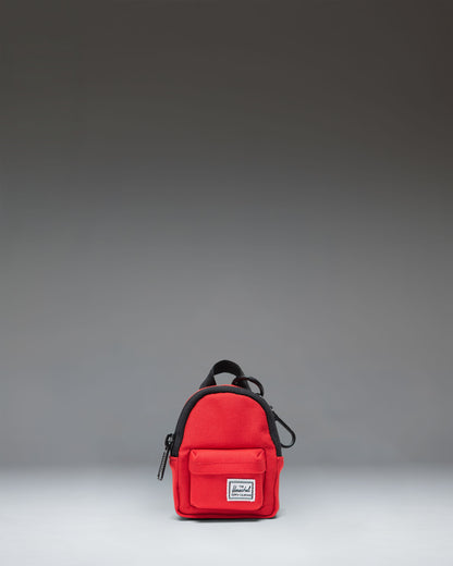 Herschel Classic Backpack Bag Charm in bright red, featuring a miniature backpack design with a front pocket and zipper details.